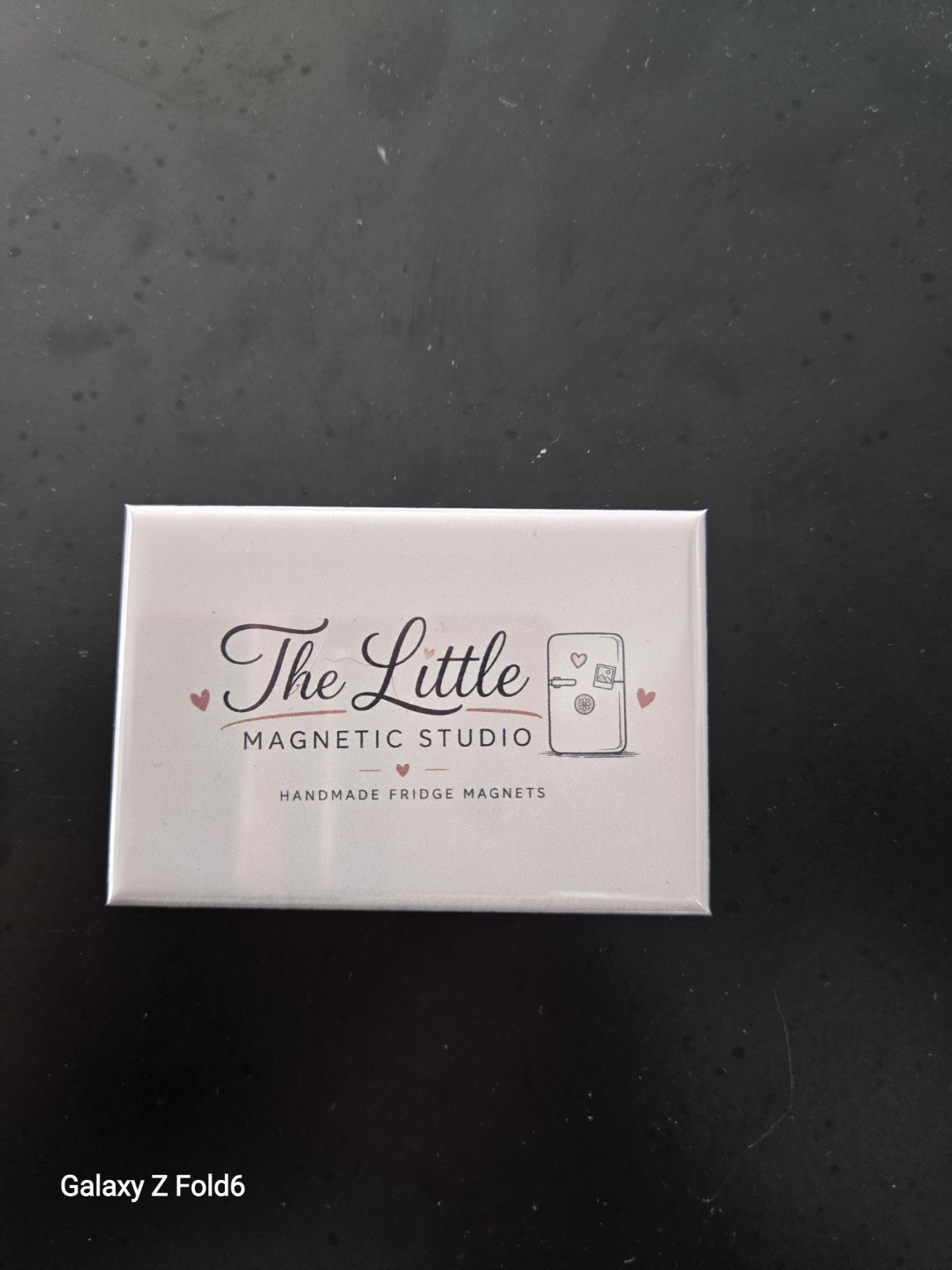 Finished business logo magnet for The Little Magnetic Studio